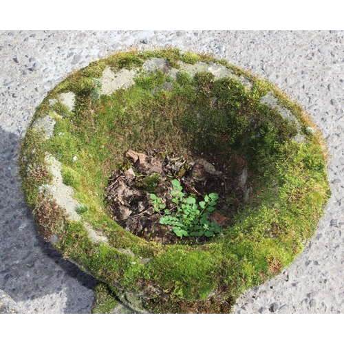 337 - A mossy concrete plinth and 2 weathered and mossy concrete urns (3)