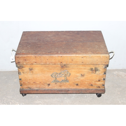 35 - A vintage pine box or chest with brass plaque and rope handles, approx 74cm wide x 42cm deep x 47cm ... 