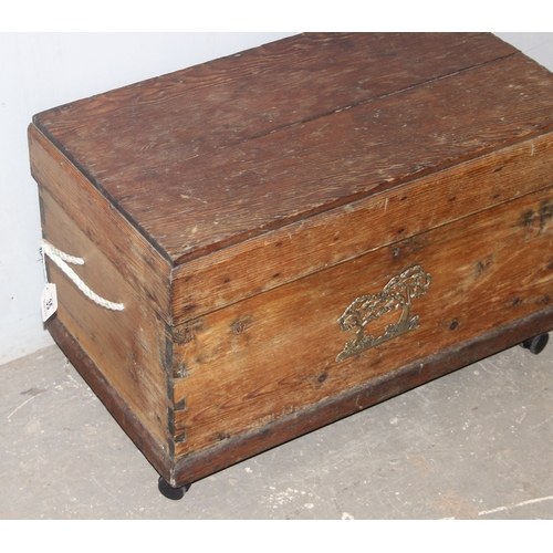 35 - A vintage pine box or chest with brass plaque and rope handles, approx 74cm wide x 42cm deep x 47cm ... 