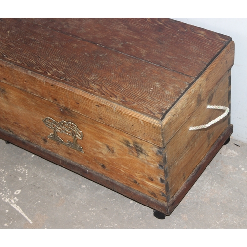 35 - A vintage pine box or chest with brass plaque and rope handles, approx 74cm wide x 42cm deep x 47cm ... 