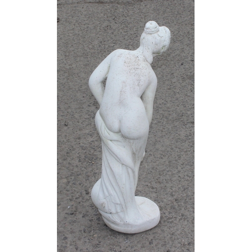 352 - A white painted garden statue of a semi-nude classical female, approx 64cm tall