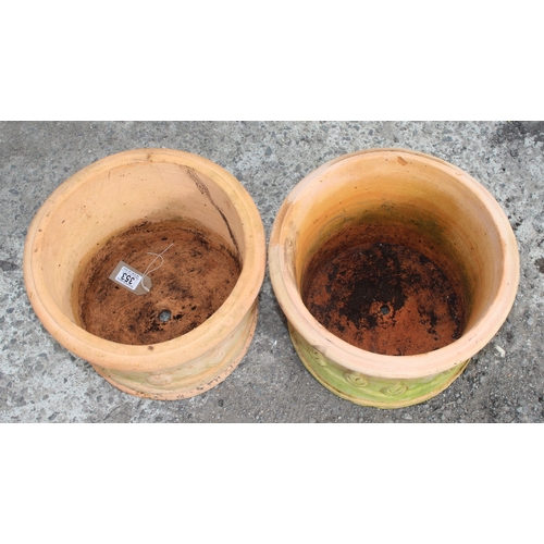 353 - A pair of decorative Terracotta garden plant pots, each approx 32cm wide x 32cm deep x 25cm tall