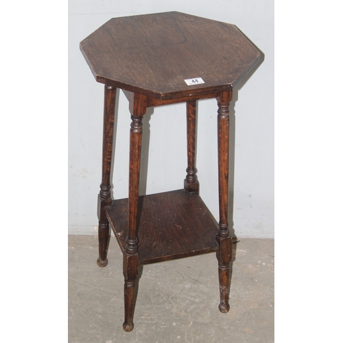 44 - A small vintage oak side table with octagonal top, approx 39cm wide x 39cm deep x 73cm tall