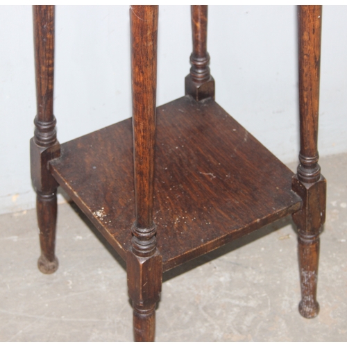 44 - A small vintage oak side table with octagonal top, approx 39cm wide x 39cm deep x 73cm tall