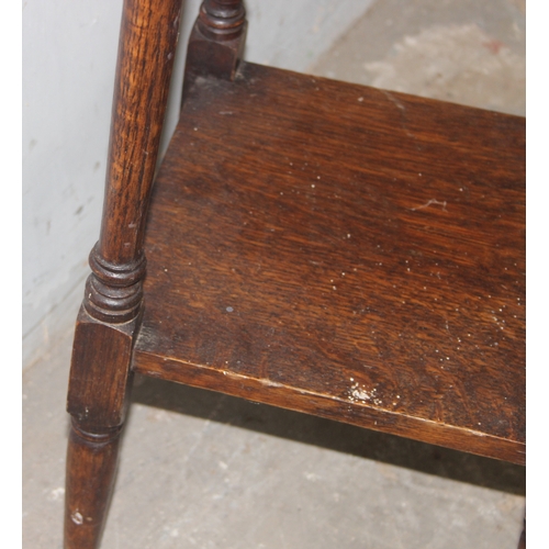 44 - A small vintage oak side table with octagonal top, approx 39cm wide x 39cm deep x 73cm tall