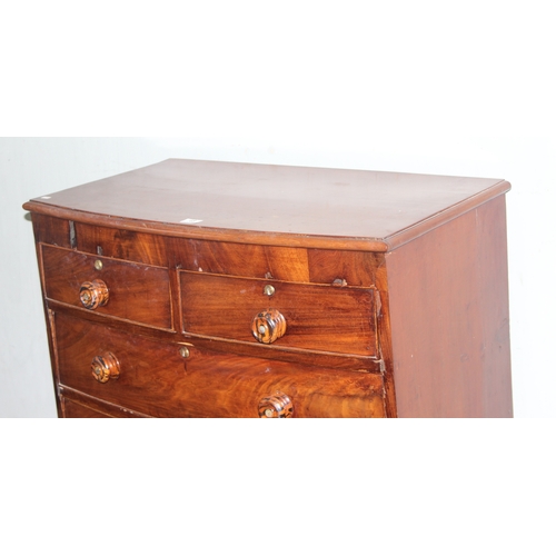 48 - A Victorian 2 over 3 mahogany chest of drawers with unusual handles and turned feet, approx 92cm wid... 