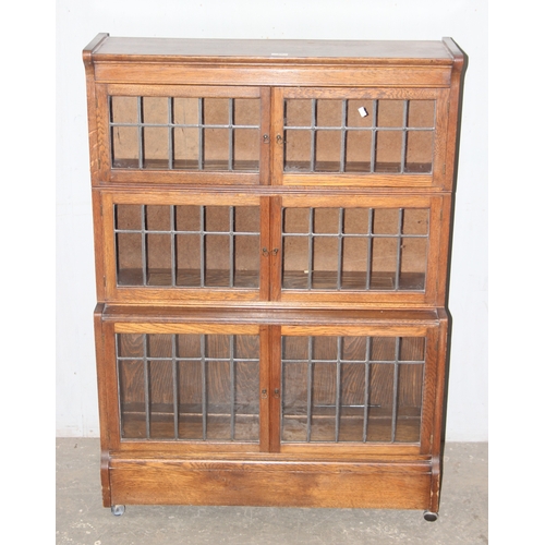 49 - A Globe Wernicke style 3 tier glazed bookcase with leaded glass, approx 88cm wide x 30cm deep x 124c... 