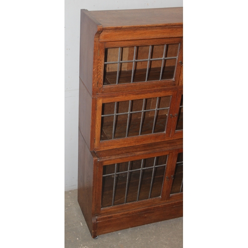 49 - A Globe Wernicke style 3 tier glazed bookcase with leaded glass, approx 88cm wide x 30cm deep x 124c... 