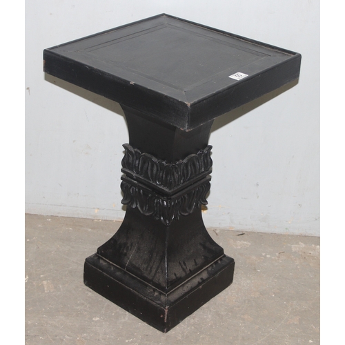 55 - An unusual black painted pedestal or stand with carved details, approx 40cm wide x 40cm deep x 63cm ... 