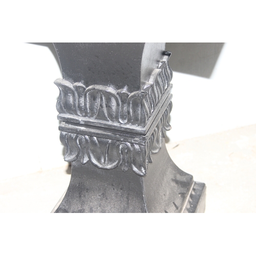 55 - An unusual black painted pedestal or stand with carved details, approx 40cm wide x 40cm deep x 63cm ... 