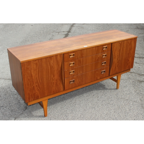 61 - A retro G-Plan style Sideboard with 4 central drawers flanked by 2 cupboards, approx 160cm wide x 47... 