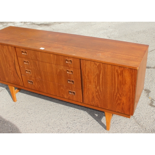 61 - A retro G-Plan style Sideboard with 4 central drawers flanked by 2 cupboards, approx 160cm wide x 47... 