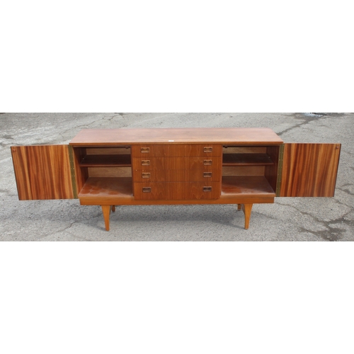 61 - A retro G-Plan style Sideboard with 4 central drawers flanked by 2 cupboards, approx 160cm wide x 47... 