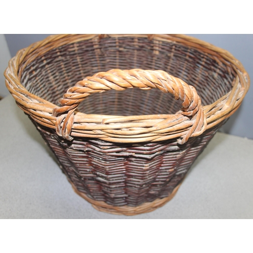 274 - Wicker log basket with handles, approx 50 x 50 x 35cm