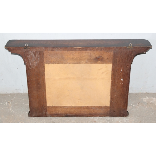 414 - Early 20th century oak framed mirror to feature two hammered-copper plaques The Artful Dodger and Sa... 