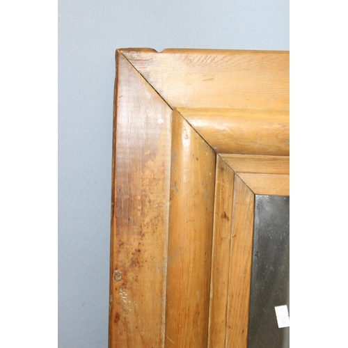 418 - A vintage mirror with thick rustic pine frame, approx 78cm x 67cm