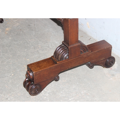 63 - An antique mahogany side table with impressive base, approx 100cm wide x 54cm deep x 58cm tall