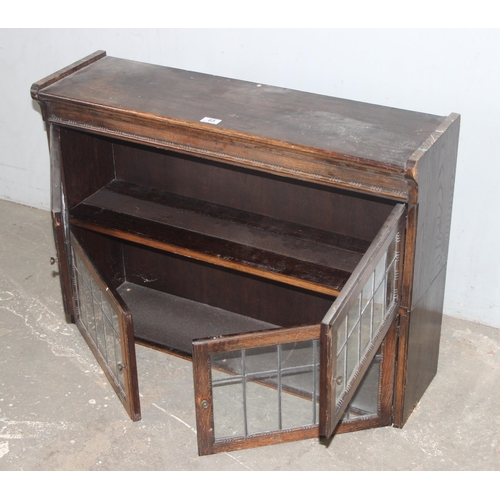 65 - An early 20th century Globe Wernicke style oak 2 section bookcase with leaded glass doors, approx 90... 