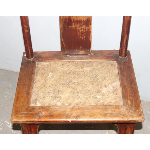 66 - A pair of Chinese Yoke back elm chairs, likely early 20th century, each approx 116cm tall