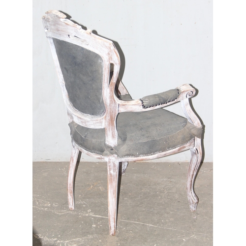 68 - A French style Fauteuil chair with white distressed painted finish, approx 59cm wide x 63cm deep x 1... 