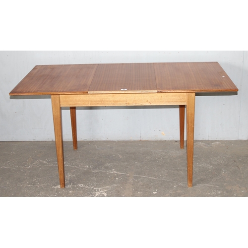 86 - Gordon Russell, a retro extending dining table, approx 153cm wide x 78cm deep x 77cm tall (108cm dee... 