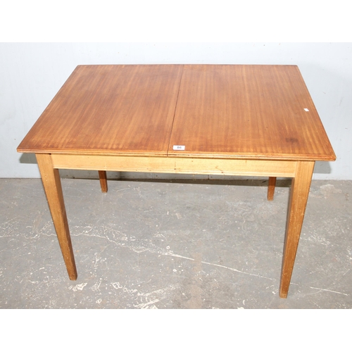 86 - Gordon Russell, a retro extending dining table, approx 153cm wide x 78cm deep x 77cm tall (108cm dee... 