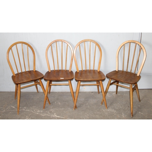 88 - A set of 4 retro Ercol hoop back dining chairs, each approx 40cm wide x 38cm deep x 84cm tall