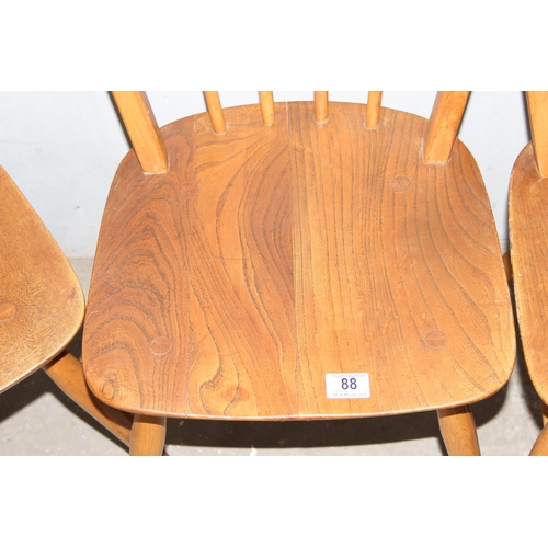 88 - A set of 4 retro Ercol hoop back dining chairs, each approx 40cm wide x 38cm deep x 84cm tall