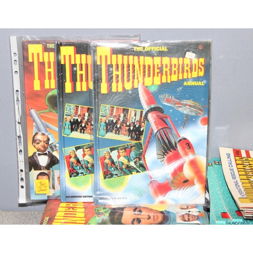 Qty of Thunderbirds books and annuals