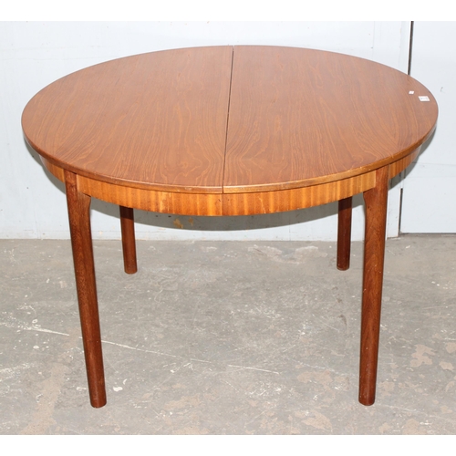 7 - A.H. McIntosh of Kirkcaldy, a retro extending dining table, approx 115cm wide x 115cm deep x 76cm ta... 