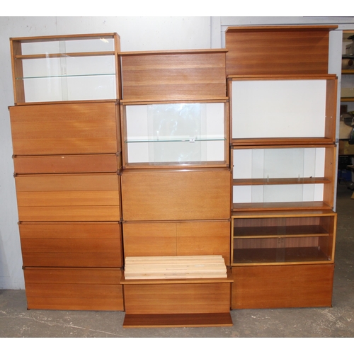 8 - Beaver & Tapley, a large qty of assorted retro wall mounted cabinets, shelves and drawers of modular... 