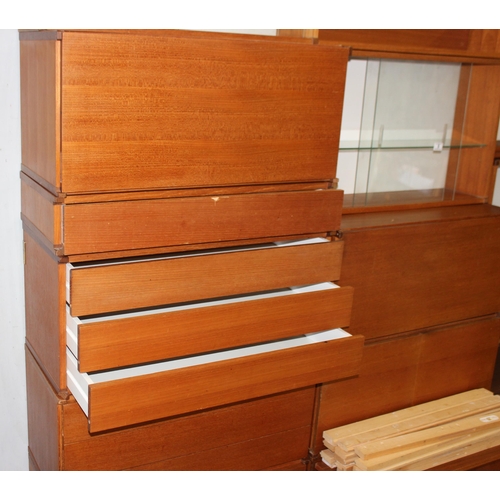 8 - Beaver & Tapley, a large qty of assorted retro wall mounted cabinets, shelves and drawers of modular... 