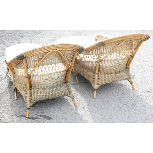 89 - A Pair of vintage wicker Loungers or chaises longues, each approx 175cm wide x 87cm deep x 90cm tall