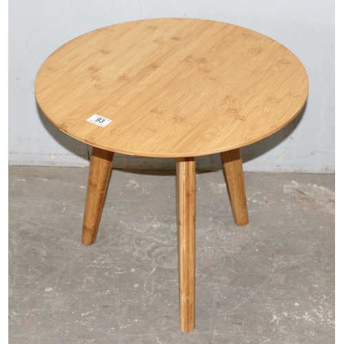 93 - A small light wood retro style side table with round top, approx 50cm wide x 50cm deep x 45cm tall