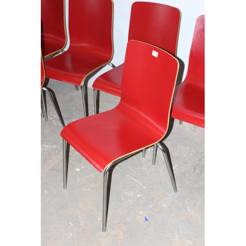 99 - A set of 6 retro style red painted bent plywood Dining Chairs with chrome legs, seemingly unmarked, ... 