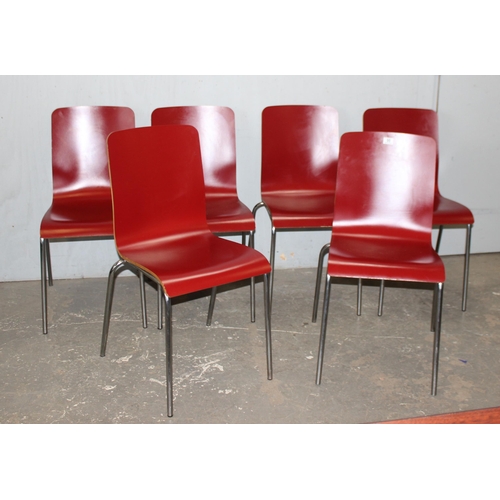 99 - A set of 6 retro style red painted bent plywood Dining Chairs with chrome legs, seemingly unmarked, ... 