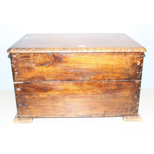 104 - Vintage oak topped blanket box/trunk with carved details, approx 74cm wide x 46cm deep x 46cm tall