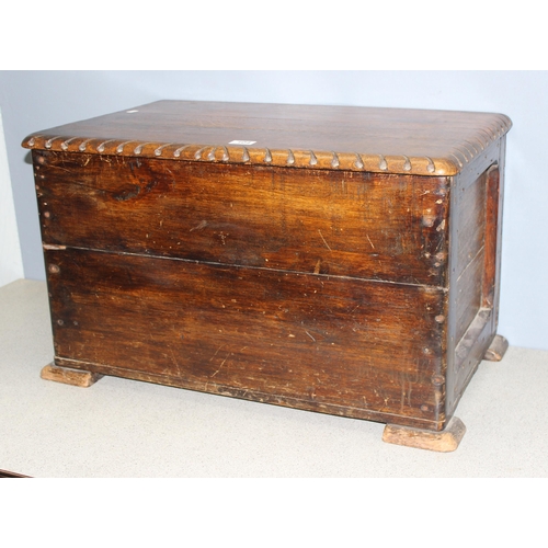 104 - Vintage oak topped blanket box/trunk with carved details, approx 74cm wide x 46cm deep x 46cm tall