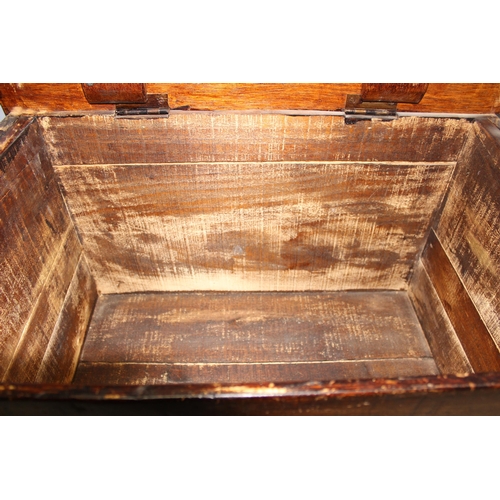 104 - Vintage oak topped blanket box/trunk with carved details, approx 74cm wide x 46cm deep x 46cm tall