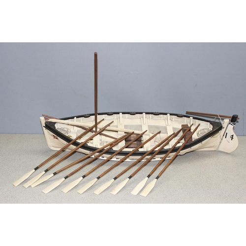 1533 - Wooden model of a vintage lifeboat with oars, approx 80cm W x 16cm H