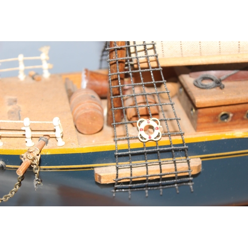 1534 - A vintage wooden model of a Three Masted Schooner ship, approx 79cm W x 63cm H