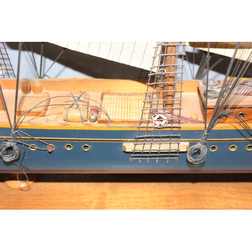 1534 - A vintage wooden model of a Three Masted Schooner ship, approx 79cm W x 63cm H