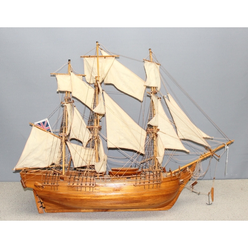 1536 - A large vintage wooden model of a warship, approx 84cm W x 70cm H