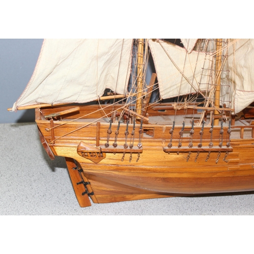 1536 - A large vintage wooden model of a warship, approx 84cm W x 70cm H