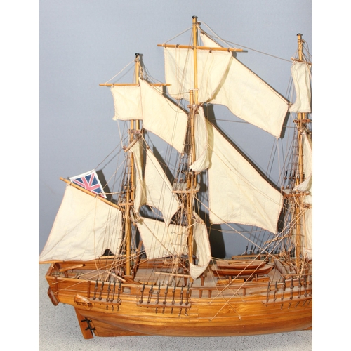 1536 - A large vintage wooden model of a warship, approx 84cm W x 70cm H