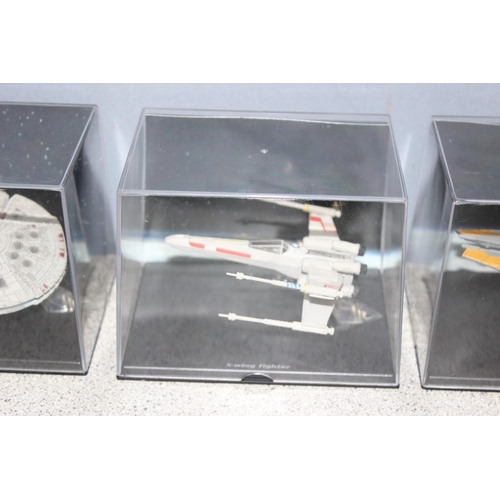 1537 - Set of 5 Lucas Film authorised miniature die cast bodied Star Wars space ships in titled Perspex dis... 