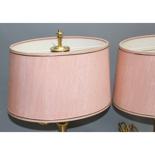 242 - Pair of dual-light brass table lamps with pink shades, approx 55cm