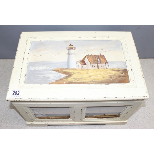 282 - Small wooden chest with hinged lid and hand-painted coastal scenes to side and top, approx 46cm wide... 