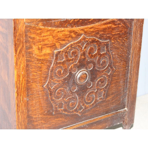 286 - 1930’s double section oak magazine/newspaper rack with carved detail to front, approx 38cm wide x 21... 