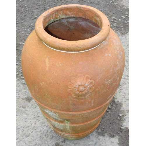 369 - A large vintage terracotta urn planter with ribbed planter, approx 34cm wide x 34cm deep x 50cm tall